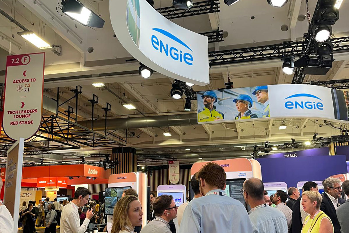 Crowd at Engie exhibition booth with digital screens and branding at a tech event