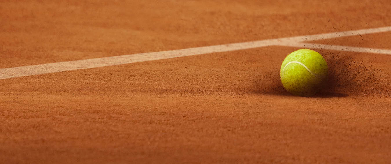 Tennis ball on tennis court